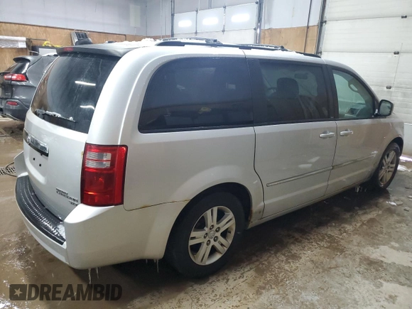 2010 Dodge Grand Caravan Crew with VIN 2D4RN6DX9AR390514, listed as a Copart auction lot 50906305 with 102,729 mi miles and Clean Title. Bid and sale history available at DreamBid. Image 3.