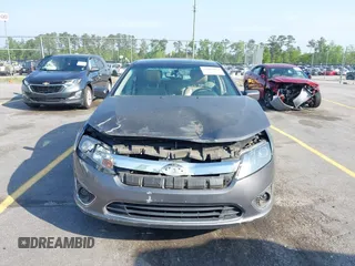 2011 Ford Fusion SEL with VIN 3FAHP0JAXBR295414, listed as a IAAI auction lot 41984604 with 164,909 mi miles. Bid and sale history available at carsss.com. Image 12.