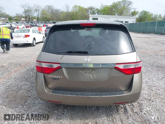 2013 Honda Odyssey EX-L with VIN 5FNRL5H65DB064238, listed as a IAAI auction lot 42050743 with 189,437 mi miles and . Bid and sale history available at carsss.com. Image 16.