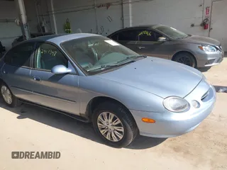 1998 Ford Taurus LX z VIN 1FAFP52U8WG119679, wystawiony jako IAAI lot #42417348 z przebiegiem 123 415 mil mil oraz . Historia ofert i sprzedaży dostępna na DreamBid. Obrazek 1.