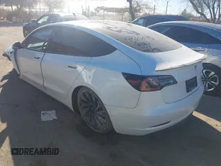 2021 Tesla Model 3 Performance with VIN 5YJ3E1EC6MF926448, listed as a IAAI auction lot 41240309 with 39,386 mi miles and . Bid and sale history available at DreamBid. Image 3.