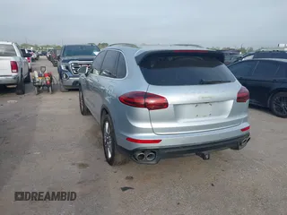 2016 Porsche Cayenne S E-Hybrid with VIN WP1AE2A26GLA59496, listed as a IAAI auction lot 41884022 with 85,386 mi miles and . Bid and sale history available at DreamBid. Image 3.