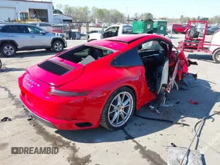2018 Porsche 911 Carrera S with VIN WP0AB2A97JS123551, listed as a IAAI auction lot 41903716 with Not Provided miles and . Bid and sale history available at DreamBid. Image 4.