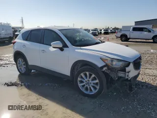 2015 Mazda CX-5 Grand Touring with VIN JM3KE2DY1F0453386, listed as a Copart auction lot 50580185 with 174,309 mi miles and Salvage Title. Bid and sale history available at carsss.com. Image 4.