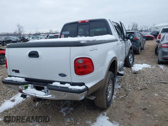 2002 Ford F-150 XLT with VIN 1FTRW08L12KA67332, listed as a IAAI auction lot 41617397 with 41,099 mi miles. Bid and sale history available at carsss.com. Image 4.