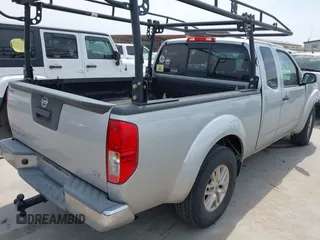 2014 Nissan Frontier SV with VIN 1N6AD0CUXEN768602, listed as a IAAI auction lot 42074514 with 77,469 mi miles and . Bid and sale history available at DreamBid. Image 4.