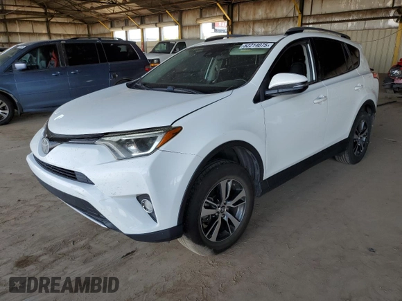 2018 Toyota RAV4 XLE with VIN JTMWFREV2JJ740145, listed as a Copart auction lot 52214075 with 129,940 mi miles and Salvage title. Bid and sale history available at DreamBid. Image 1.