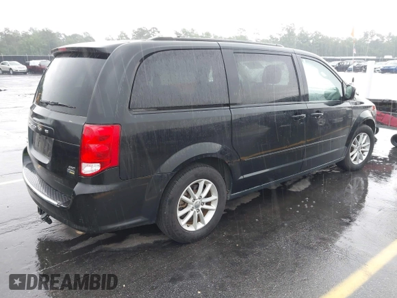 2015 Dodge Grand Caravan SXT with VIN 2C4RDGCG8FR556861, listed as a IAAI auction lot 42224948 with 110,797 mi miles and . Bid and sale history available at DreamBid. Image 4.