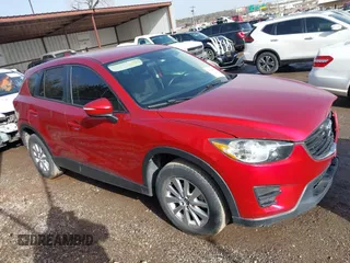 2016 Mazda CX-5 Sport with VIN JM3KE2BY3G0754391, listed as a IAAI auction lot 41719461 with 79,130 mi miles. Bid and sale history available at carsss.com. Image 13.