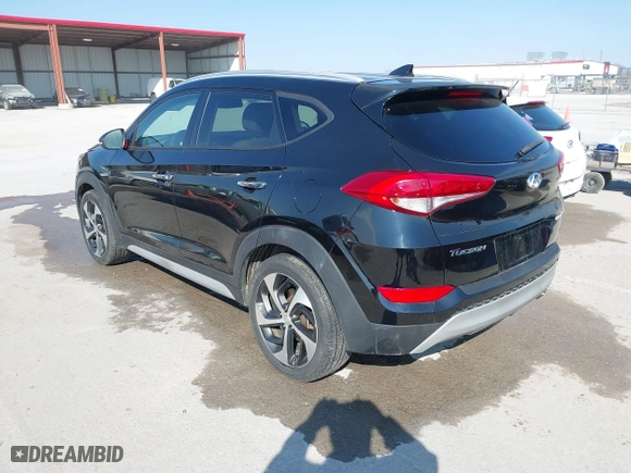 2017 Hyundai Tucson Value with VIN KM8J33A25HU586191, listed as a IAAI auction lot 41682127 with 58,877 mi miles. Bid and sale history available at carsss.com. Image 3.