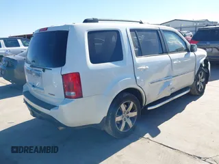 2012 Honda Pilot Touring with VIN 5FNYF3H91CB020673, listed as a IAAI auction lot 41721836 with 123,607 mi miles and . Bid and sale history available at carsss.com. Image 4.