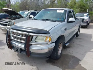 2002 Ford F-150 XL with VIN 1FTRX17W62NC05363, listed as a IAAI auction lot 41897174 with 1 mi miles. Bid and sale history available at carsss.com. Image 2.