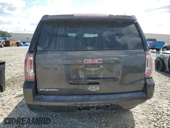2020 GMC Yukon SLT with VIN 1GKS1BKC3LR238700, listed as a Copart auction lot 74897254 with 82,806 mi miles and Salvage Title. Bid and sale history available at DreamBid. Image 6.