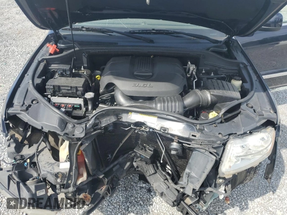 2011 Jeep Grand Cherokee Laredo with VIN 1J4RR4GG7BC515001, listed as a Copart auction lot 56432905 with 143,181 mi miles and Salvage title. Bid and sale history available at DreamBid. Image 12.