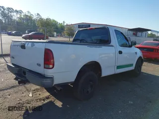 2002 Ford F-150 XL z VIN 1FTRF17L22NB18648, wystawiony jako IAAI lot #41843041 z przebiegiem 90 033 mil mil oraz . Historia ofert i sprzedaży dostępna na DreamBid. Obrazek 4.