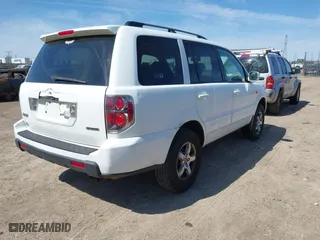 2007 Honda Pilot EX-L with VIN 5FNYF18777B002106, listed as a IAAI auction lot 42060765 with 202,276 mi miles. Bid and sale history available at carsss.com. Image 4.