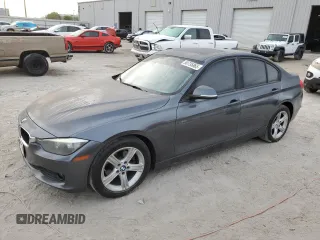 2015 BMW 3 Series 320i with VIN WBA3B1G50FNT06526, listed as a Copart auction lot 50735865 with 128,001 mi miles and Salvage Title. Bid and sale history available at carsss.com. Image 1.