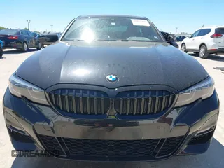2022 BMW 3 Series 330i with VIN 3MW5R1J08N8C38592, listed as a IAAI auction lot 41832394 with 48,980 mi miles. Bid and sale history available at carsss.com. Image 12.