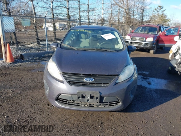 2013 Ford Fiesta S z VIN 3FADP4TJ5DM164278, wystawiony jako IAAI lot #41588415 z przebiegiem 13 403 mil mil oraz . Historia ofert i sprzedaży dostępna na DreamBid. Obrazek 6.