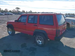 1996 Jeep Cherokee SE with VIN 1J4FT28S0TL225891, listed as a IAAI auction lot 41411705 with 233,983 mi miles and . Bid and sale history available at DreamBid. Image 3.