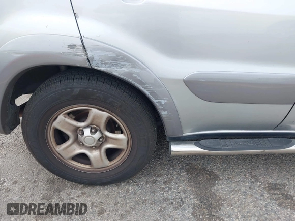 2005 Toyota RAV4 with VIN JTEHD20V750051092, listed as a IAAI auction lot 42083255 with 201,783 mi miles. Bid and sale history available at carsss.com. Image 12.
