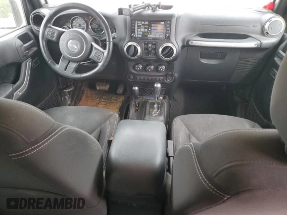 2016 Jeep Wrangler Unlimited Sahara with VIN 1C4BJWEGXGL264740, listed as a Copart auction lot 57225115 with 183,647 mi miles and Salvage title. Bid and sale history available at DreamBid. Image 8.