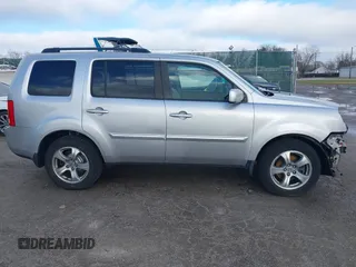 2013 Honda Pilot EX-L with VIN 5FNYF3H76DB013332, listed as a IAAI auction lot 41193240 with 121,308 mi miles and . Bid and sale history available at DreamBid. Image 14.
