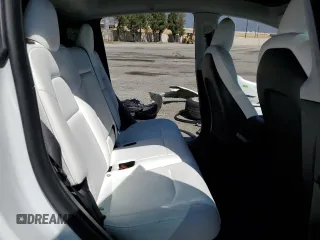 2022 Tesla Model Y Long Range with VIN 7SAYGDEE8NF551850, listed as a Copart auction lot 52747195 with 62,340 mi miles and Salvage Title. Bid and sale history available at carsss.com. Image 12.