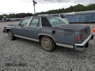 1985 Ford Crown Victoria z VIN 2FABP43F6FX102527, wystawiony jako Copart lot #71747574 z przebiegiem 50 249 mil mil oraz Nie do naprawy. Historia ofert i sprzedaży dostępna na DreamBid. Obrazek 2.