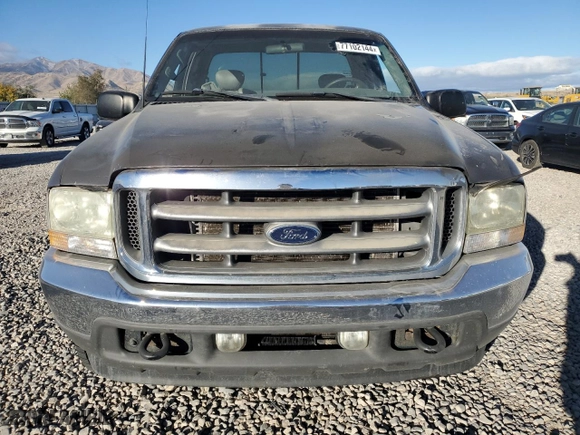 2002 Ford Super Duty F-350 SRW XL with VIN 1FTSX31FX2EB36411, listed as a Copart auction lot 77102144 with 0 mi miles and Salvage Title. Bid and sale history available at carsss.com. Image 5.
