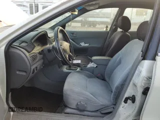 2003 Mitsubishi Galant ES z VIN 4A3AA46G43E124340, wystawiony jako Copart lot #74021014 z przebiegiem 220 226 mil mil oraz Szkoda całkowita • Salvage title. Historia ofert i sprzedaży dostępna na DreamBid. Obrazek 7.