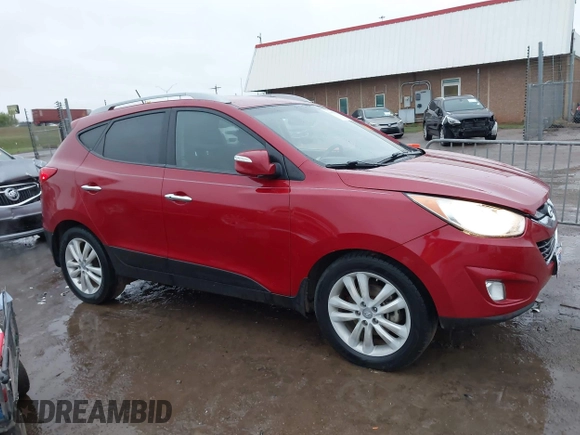 2013 Hyundai Tucson GLS with VIN KM8JU3AC8DU683546, listed as a IAAI auction lot 41956167 with 141,510 mi miles. Bid and sale history available at carsss.com. Image 13.
