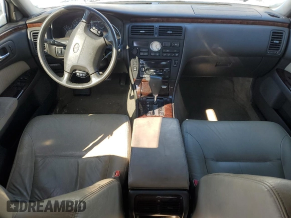 1999 Infiniti Q45 z VIN JNKBY31A2XM602927, wystawiony jako Copart lot #45627825 z przebiegiem 174 080 mil mil oraz Szkody całkowita. Historia ofert i sprzedaży dostępna na DreamBid. Obrazek 8.