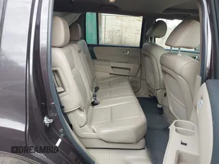 2013 Honda Pilot EX-L with VIN 5FNYF4H76DB016821, listed as a IAAI auction lot 41477343 with 129,689 mi miles and . Bid and sale history available at DreamBid. Image 8.
