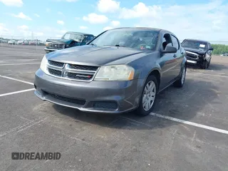 2014 Dodge Avenger SE with VIN 1C3CDZAB3EN219717, listed as a IAAI auction lot 42737543 with 157,362 mi miles and . Bid and sale history available at DreamBid. Image 2.