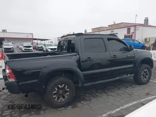 2009 Toyota Tacoma PreRunner with VIN 3TMJU62N99M076105, listed as a IAAI auction lot 42709523 with 206,948 mi miles and . Bid and sale history available at DreamBid. Image 14.