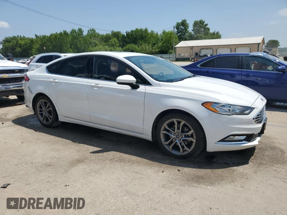 2017 Ford Fusion SE с VIN 3FA6P0H75HR406364, выставлен на аукционе Copart как лот 62405635 с пробегом 98 873 миль миль и Списание • Salvage title. История ставок и продаж доступна на DreamBid. Изображение 4.