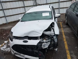 2014 Ford Focus ST with VIN 1FADP3L94EL256548, listed as a IAAI auction lot 40936756 with 79,340 mi miles and . Bid and sale history available at carsss.com. Image 13.