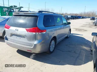 2011 Toyota Sienna XLE AAS with VIN 5TDYK3DC6BS147636, listed as a IAAI auction lot 41759192 with 182,966 mi miles and . Bid and sale history available at DreamBid. Image 4.