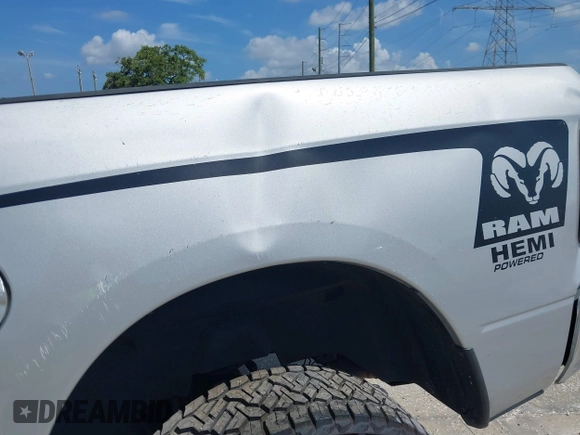 2014 Ram 1500 SLT z VIN 1C6RR6GT9ES477819, wystawiony jako IAAI lot #42358824 z przebiegiem 145 044 mil mil oraz . Historia ofert i sprzedaży dostępna na DreamBid. Obrazek 19.