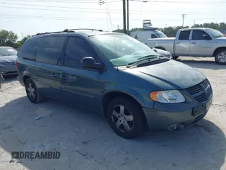 2005 Dodge Caravan SXT with VIN 2D8GP44L55R130702, listed as a IAAI auction lot 42090867 with 232,655 mi miles. Bid and sale history available at carsss.com. Image 1.