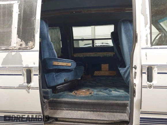 1994 Chevrolet Astro Cargo z VIN 1GBDM19Z0RB167297, wystawiony jako IAAI lot #42305621 z przebiegiem 154 683 mil mil oraz . Historia ofert i sprzedaży dostępna na DreamBid. Obrazek 8.