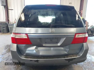 2007 Honda Odyssey EX-L z VIN 5FNRL38617B078923, wystawiony jako IAAI lot #42335122 z przebiegiem 154 352 mil mil oraz . Historia ofert i sprzedaży dostępna na DreamBid. Obrazek 16.