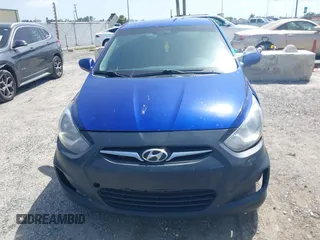 2013 Hyundai Accent GS with VIN KMHCT5AEXDU128879, listed as a IAAI auction lot 42463478 with 213,810 mi miles and . Bid and sale history available at DreamBid. Image 12.