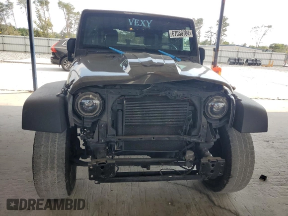 2018 Jeep Wrangler JK Unlimited Sport S with VIN 1C4BJWDG9JL835448, listed as a Copart auction lot 67050784 with 134,168 mi miles and Salvage Title. Bid and sale history available at carsss.com. Image 5.