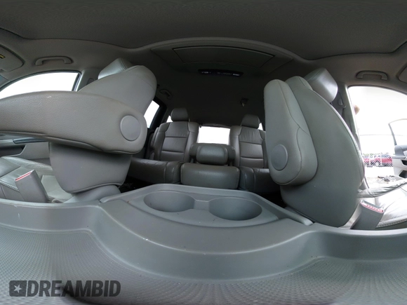 2012 Honda Odyssey Touring with VIN 5FNRL5H97CB066596, listed as a IAAI auction lot 42472935 with 217,182 mi miles and . Bid and sale history available at DreamBid. Image 18.