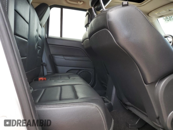 2014 Jeep Patriot Latitude z VIN 1C4NJPFA1ED680177, wystawiony jako Copart lot #58317165 z przebiegiem 40 806 mil mil oraz Szkoda całkowita • Salvage title. Historia ofert i sprzedaży dostępna na DreamBid. Obrazek 11.