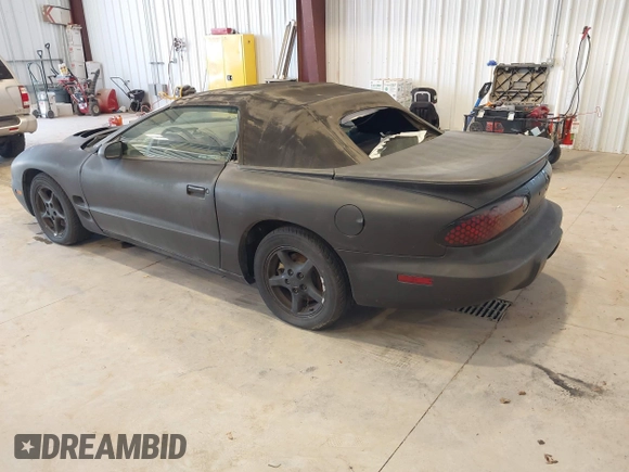 2000 Pontiac Firebird Firebird z VIN 2G2FS32KXY2146392, wystawiony jako IAAI lot #42506629 z przebiegiem 161 077 mil mil oraz . Historia ofert i sprzedaży dostępna na DreamBid. Obrazek 3.