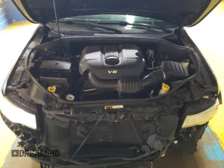 2015 Jeep Grand Cherokee Overland with VIN 1C4RJFCG8FC653117, listed as a Copart auction lot 49254595 with 142,359 mi miles and Clean Title. Bid and sale history available at carsss.com. Image 12.