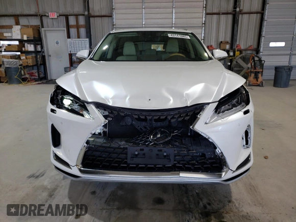 2020 Lexus RX 350L with VIN JTJHZKFA3L2025792, listed as a Copart auction lot 43141085 with 95,096 mi miles and Salvage title. Bid and sale history available at DreamBid. Image 5.